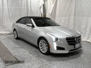 2014 Cadillac CTS Luxury AWD z VIN 1G6AX5S34E0124190, wystawiony jako Copart lot #57848785 z przebiegiem 63 259 mil mil oraz Czysty tytuł • Clean title. Historia ofert i sprzedaży dostępna na DreamBid. Obrazek 1.