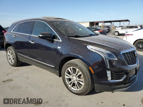 2021 Cadillac XT5 FWD Premium Luxury with VIN 1GYKNCRS5MZ138712, listed as a Copart auction lot 49697945 with 54,893 mi miles and Salvage Title. Bid and sale history available at carsss.com. Image 4.