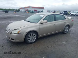 2006 Toyota Avalon XL with VIN 4T1BK36B26U119629, listed as a IAAI auction lot 39152919 with 128,953 mi miles. Bid and sale history available at carsss.com. Image 2.