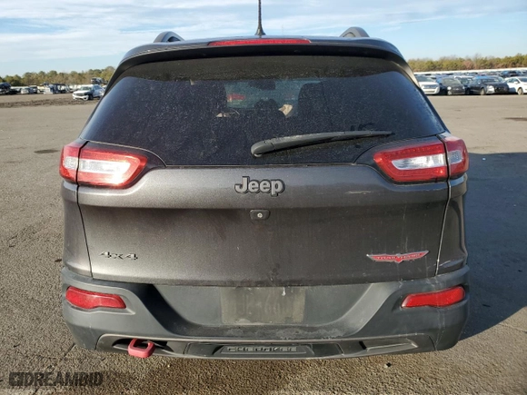 2015 Jeep Cherokee Trailhawk with VIN 1C4PJMBB0FW719904, listed as a Copart auction lot 88491845 with 143,550 mi miles and Non Repairable. Bid and sale history available at carsss.com. Image 6.