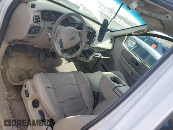 2003 Ford F-150 XL with VIN 1FTRX18L03NA96484, listed as a Copart auction lot 50834755 with 242,836 mi miles and Salvage title. Bid and sale history available at DreamBid. Image 8.