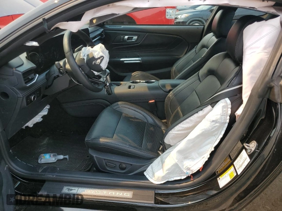 2024 Ford Mustang EcoBoost with VIN 1FA6P8TH5R5121733, listed as a Copart auction lot 50717815 with 9,748 mi miles and Salvage Title. Bid and sale history available at carsss.com. Image 7.