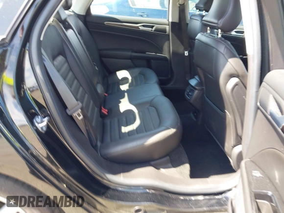 2016 Ford Fusion SE Hybrid with VIN 3FA6P0LU9GR405102, listed as a IAAI auction lot 42358807 with 91,130 mi miles and . Bid and sale history available at DreamBid. Image 8.