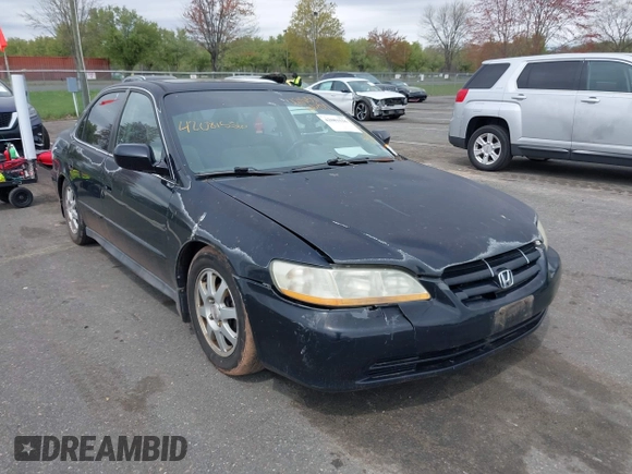 2002 Honda Accord SE z VIN 1HGCG66812A084949, wystawiony jako IAAI lot #42081536 z przebiegiem 309 920 mil mil oraz . Historia ofert i sprzedaży dostępna na DreamBid. Obrazek 6.