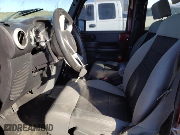 2010 Jeep Wrangler Unlimited Sahara with VIN 1J4BA5H1XAL196555, listed as a Copart auction lot 76704534 with 112,365 mi miles and Salvage Title. Bid and sale history available at carsss.com. Image 7.