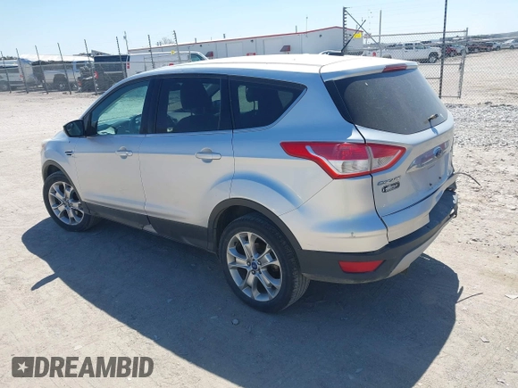 2013 Ford Escape SEL with VIN 1FMCU9H91DUA14749, listed as a IAAI auction lot 42039685 with 186,669 mi miles. Bid and sale history available at carsss.com. Image 3.
