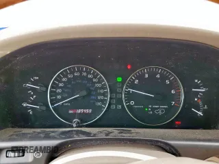 2003 Lexus LX 470 z VIN JTJHT00W033530306, wystawiony jako Copart lot #57162675 z przebiegiem 185 458 mil mil oraz Szkody całkowita. Historia ofert i sprzedaży dostępna na DreamBid. Obrazek 9.