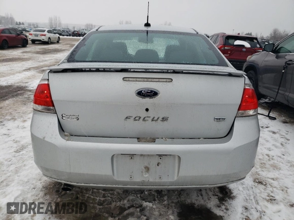 2009 Ford Focus SES with VIN 1FAHP36N19W214689, listed as a Copart auction lot 43001385 with 295,859 mi miles and Salvage Title. Bid and sale history available at carsss.com. Image 6.