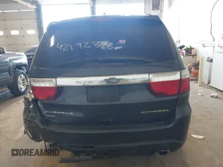 2013 Dodge Durango Citadel with VIN 1C4SDJET2DC529573, listed as a IAAI auction lot 42192878 with 217,445 mi miles and . Bid and sale history available at DreamBid. Image 16.