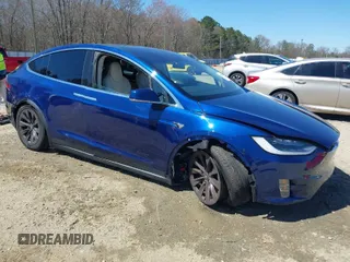 2017 Tesla Model X 90D with VIN 5YJXCBE26HF079022, listed as a IAAI auction lot 41847954 with 74,940 mi miles and . Bid and sale history available at DreamBid. Image 1.