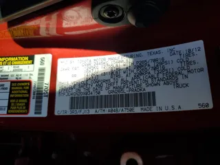 2013 Toyota Tacoma PreRunner z VIN 5TFJU4GN2DX034150, wystawiony jako Copart lot #77808844 z przebiegiem 112 621 mil mil oraz Szkoda całkowita • Salvage title. Historia ofert i sprzedaży dostępna na DreamBid. Obrazek 14.
