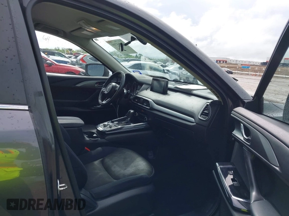 2016 Mazda CX-9 Sport with VIN JM3TCABY5G0122478, listed as a IAAI auction lot 42115795 with 134,980 mi miles and . Bid and sale history available at DreamBid. Image 5.