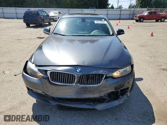 2015 BMW 3 Series 328i xDrive with VIN WBA3B3C5XFJ985147, listed as a Copart auction lot 59819905 with 113,492 mi miles and Salvage title. Bid and sale history available at DreamBid. Image 5.
