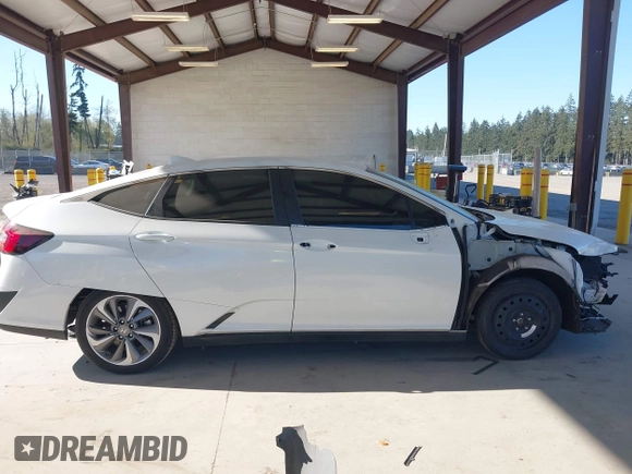 2018 Honda Clarity Plug-In Hybrid Touring with VIN JHMZC5F38JC003207, listed as a IAAI auction lot 42057987 with 35,420 mi miles. Bid and sale history available at carsss.com. Image 14.