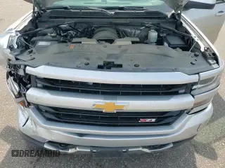 2017 Chevrolet Silverado 1500 LT z VIN 1GCUKREC7HF116128, wystawiony jako Copart lot #81398405 z przebiegiem 143 219 mil mil oraz Szkoda całkowita • Salvage title. Historia ofert i sprzedaży dostępna na DreamBid. Obrazek 15.