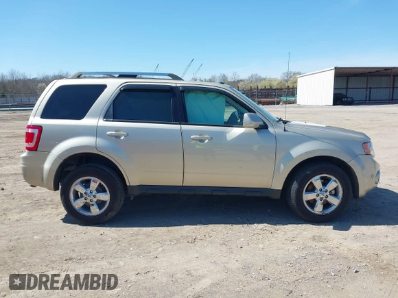 2011 Ford Escape Limited with VIN 1FMCU9EG7BKA25766, listed as a IAAI auction lot 41810992 with 74,226 mi miles. Bid and sale history available at carsss.com. Image 13.