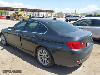 2014 BMW 5 Series 535i with VIN WBA5B1C51ED483069, listed as a IAAI auction lot 41945334 with 135,871 mi miles. Bid and sale history available at carsss.com. Image 3.