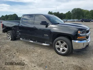 2017 Chevrolet Silverado 1500 LT with VIN 1GCPCREC4HF160372, listed as a Copart auction lot 69954784 with 154,585 mi miles and Salvage Title. Bid and sale history available at DreamBid. Image 4.