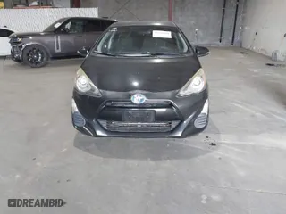 2016 Toyota Prius c One with VIN JTDKDTB33G1121860, listed as a IAAI auction lot 41710564 with 77,184 mi miles. Bid and sale history available at carsss.com. Image 6.