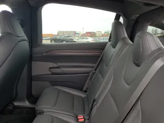 2023 Tesla Model X with VIN 7SAXCDE51PF415778, listed as a Copart auction lot 51792205 with Not Provided miles and Salvage Title. Bid and sale history available at DreamBid. Image 11.