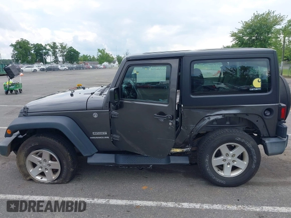 2016 Jeep Wrangler Willys Wheeler with VIN 1C4GJWAG2GL318981, listed as a IAAI auction lot 42390588 with 131,559 mi miles and . Bid and sale history available at DreamBid. Image 14.