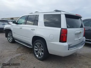 2018 Chevrolet Tahoe Premier with VIN 1GNSCCKC1JR305097, listed as a IAAI auction lot 41233962 with 154,043 mi miles. Bid and sale history available at carsss.com. Image 3.