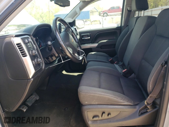 2015 Chevrolet Silverado 1500 LT with VIN 1GCVKREC7FZ435447, listed as a Copart auction lot 54519515 with 124,881 mi miles and Salvage Title. Bid and sale history available at DreamBid. Image 7.