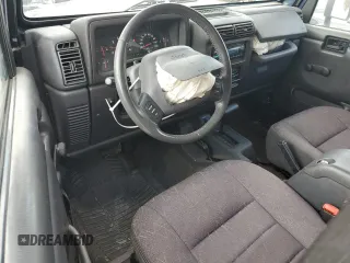 2002 Jeep Wrangler Sport with VIN 1J4FA49S72P722606, listed as a Copart auction lot 72525484 with 104,391 mi miles and Salvage Title. Bid and sale history available at carsss.com. Image 8.