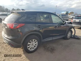 2014 Mazda CX-5 Touring with VIN JM3KE2CY9E0336218, listed as a Copart auction lot 49213255 with 124,749 mi miles and Salvage Title. Bid and sale history available at carsss.com. Image 3.