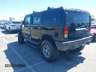 2003 Hummer H2 z VIN 5GRGN23U63H117676, wystawiony jako IAAI lot #41816411 z przebiegiem Nie podano mil oraz . Historia ofert i sprzedaży dostępna na DreamBid. Obrazek 3.