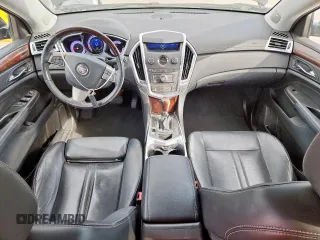2012 Cadillac SRX Premium Collection with VIN 3GYFNCE3XCS596550, listed as a Copart auction lot 63011585 with 98,004 mi miles and Salvage title. Bid and sale history available at DreamBid. Image 8.