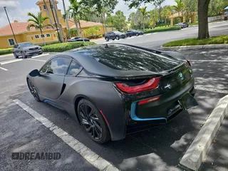 2016 BMW i8 z VIN WBY2Z2C56GV676028, wystawiony jako Copart lot #60555965 z przebiegiem 46 386 mil mil oraz Czysty tytuł • Clean title. Historia ofert i sprzedaży dostępna na DreamBid. Obrazek 3.