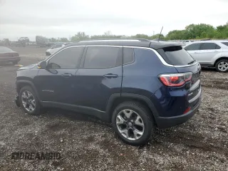 2018 Jeep Compass Limited with VIN 3C4NJDCB4JT128687, listed as a Copart auction lot 57648245 with 136,455 mi miles and Salvage title. Bid and sale history available at DreamBid. Image 2.