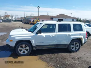 2014 Jeep Patriot Latitude with VIN 1C4NJPFA8ED550221, listed as a IAAI auction lot 41919419 with 185,386 mi miles and . Bid and sale history available at carsss.com. Image 14.