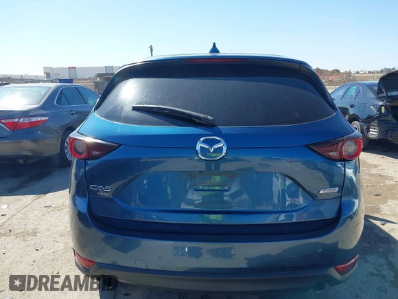 2018 Mazda CX-5 Touring with VIN JM3KFBCM0J0302916, listed as a IAAI auction lot 41837733 with 100,765 mi miles. Bid and sale history available at carsss.com. Image 17.