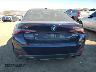 2024 BMW i4 eDrive40 with VIN WBY73AW03RFS35715, listed as a Copart auction lot 87730595 with 10,811 mi miles and Salvage Title. Bid and sale history available at carsss.com. Image 6.