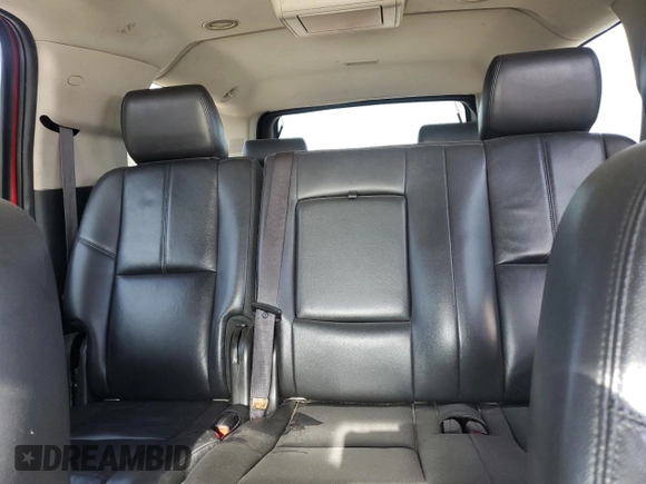 2013 Chevrolet Suburban LT with VIN 1GNSCJE08DR374024, listed as a Copart auction lot 54873375 with 141,206 mi miles and Salvage title. Bid and sale history available at DreamBid. Image 10.
