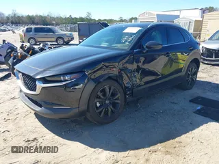 2022 Mazda CX-30 2.5 Turbo Premium Package with VIN 3MVDMBDY4NM446866, listed as a IAAI auction lot 41704578 with 24,360 mi miles. Bid and sale history available at carsss.com. Image 2.