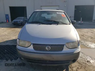 2001 Mercury Villager z VIN 4M2ZV12T71DJ00168, wystawiony jako Copart lot #71234784 z przebiegiem 213 522 mil mil oraz Nie do naprawy. Historia ofert i sprzedaży dostępna na DreamBid. Obrazek 5.