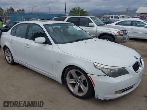 2009 BMW 5 Series 528i with VIN WBANU53529C121927, listed as a IAAI auction lot 42063066 with 195,322 mi miles and . Bid and sale history available at carsss.com. Image 1.