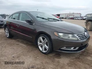 2013 Volkswagen CC Sport with VIN WVWBN7AN2DE520545, listed as a IAAI auction lot 41541009 with 132,934 mi miles and . Bid and sale history available at DreamBid. Image 1.