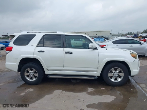 2011 Toyota 4Runner SR5 with VIN JTEZU5JR7B5014100, listed as a IAAI auction lot 41769637 with 215,474 mi miles. Bid and sale history available at carsss.com. Image 13.