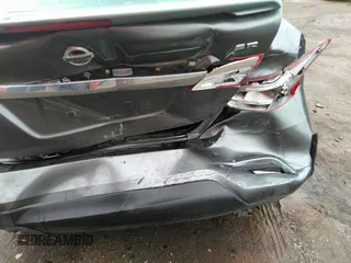 2019 Nissan Sentra S z VIN 3N1AB7AP9KY344795, wystawiony jako IAAI lot #35662494 z przebiegiem 89 521 mil mil oraz . Historia ofert i sprzedaży dostępna na DreamBid. Obrazek 6.