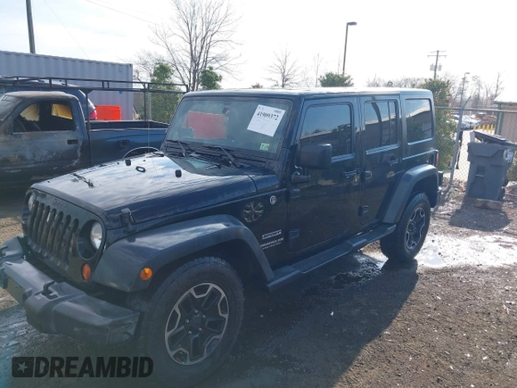 2013 Jeep Wrangler Unlimited Freedom z VIN 1C4BJWDG8DL648870, wystawiony jako IAAI lot #41909372 z przebiegiem 184 203 mil mil oraz . Historia ofert i sprzedaży dostępna na DreamBid. Obrazek 2.