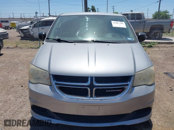 2013 Dodge Grand Caravan SE with VIN 2C4RDGBG0DR702913, listed as a IAAI auction lot 42007786 with 163,981 mi miles and . Bid and sale history available at DreamBid. Image 6.
