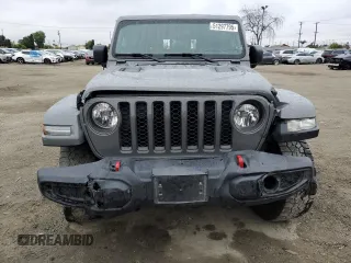 2021 Jeep Gladiator Rubicon with VIN 1C6JJTBG5ML615653, listed as a Copart auction lot 51297795 with 48,918 mi miles and Salvage title. Bid and sale history available at DreamBid. Image 5.