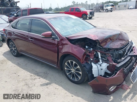 2014 Toyota Avalon Limited z VIN 4T1BK1EB5EU122996, wystawiony jako IAAI lot #42292676 z przebiegiem 157 690 mil mil oraz . Historia ofert i sprzedaży dostępna na DreamBid. Obrazek 1.