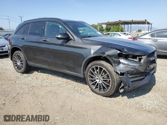 2021 Mercedes-Benz GLC 300 with VIN W1N0G8EB8MF872703, listed as a Copart auction lot 60322035 with 56,609 mi miles and Salvage title. Bid and sale history available at DreamBid. Image 4.