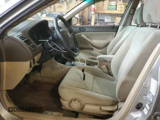 2004 Honda Civic LX with VIN 2HGES16694H910914, listed as a Copart auction lot 64241214 with 150,628 mi miles and Salvage Title. Bid and sale history available at DreamBid. Image 7.