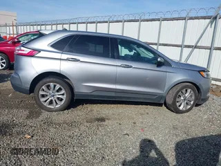2022 Ford Edge Titanium z VIN 2FMPK4K95NBA38997, wystawiony jako IAAI lot #41467300 z przebiegiem 74 310 mil mil oraz . Historia ofert i sprzedaży dostępna na DreamBid. Obrazek 13.